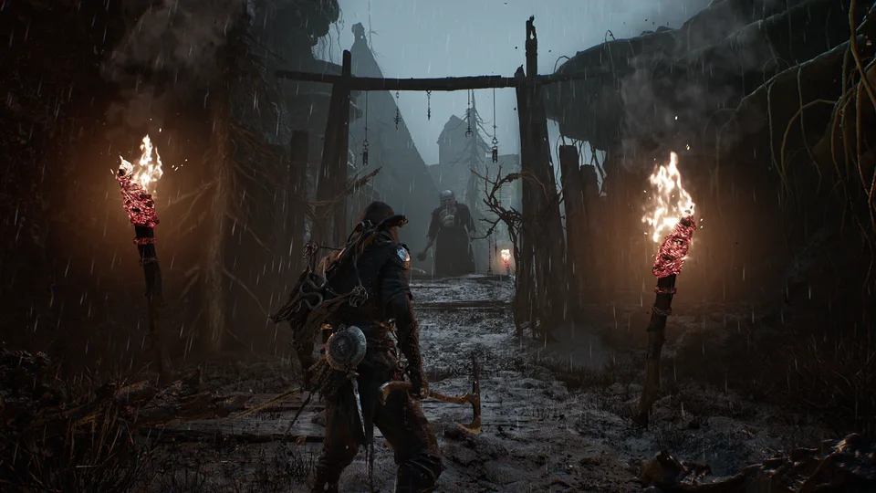 A warrior approaching a torchlit gateway